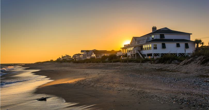 Minimum down payment second home featured image: Two-story beachfront house.